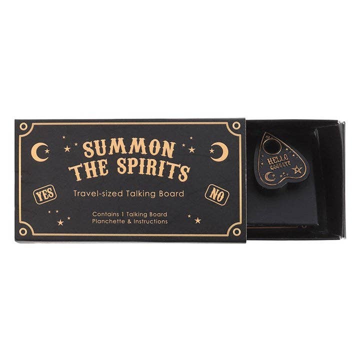 Close-up van zwart-goud ontwerp met planchette – miniatuur spirit board set.