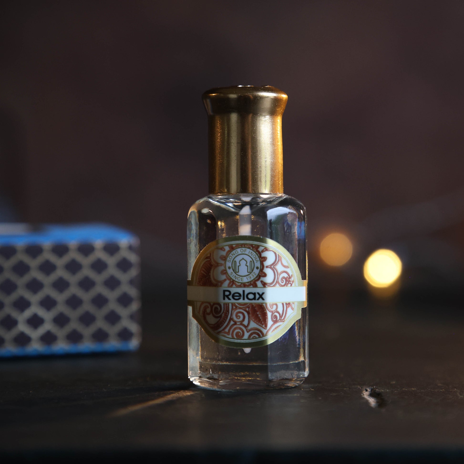 Glazen flesje Parfum Geurolie Relax met citrus-bergamot en rozekwarts, verpakt in geschenkdoosje