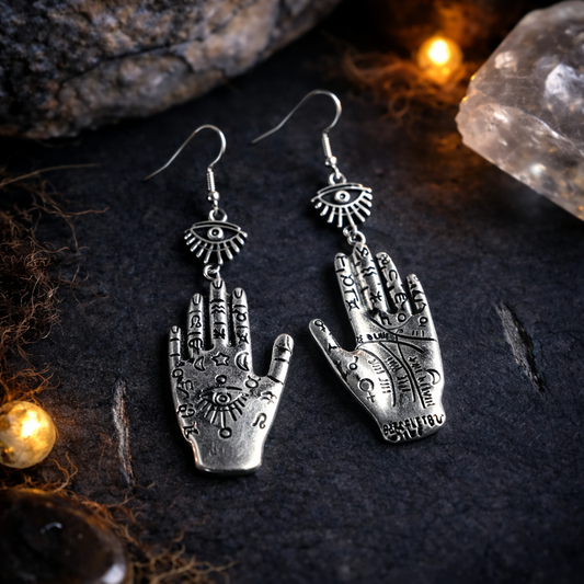 Handlezer oorbellen zilverkleurig mystiek design