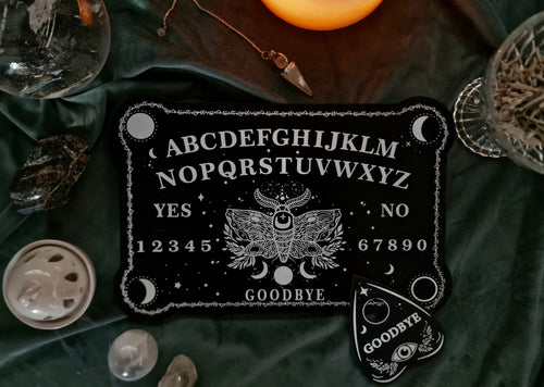 Ouija board talking board wicca wild wicked and free
